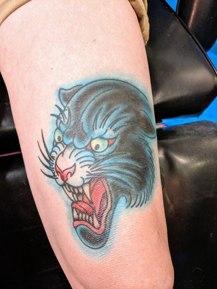 Black-Cougar-thigh-tattoo - Faux Tattoo Studios